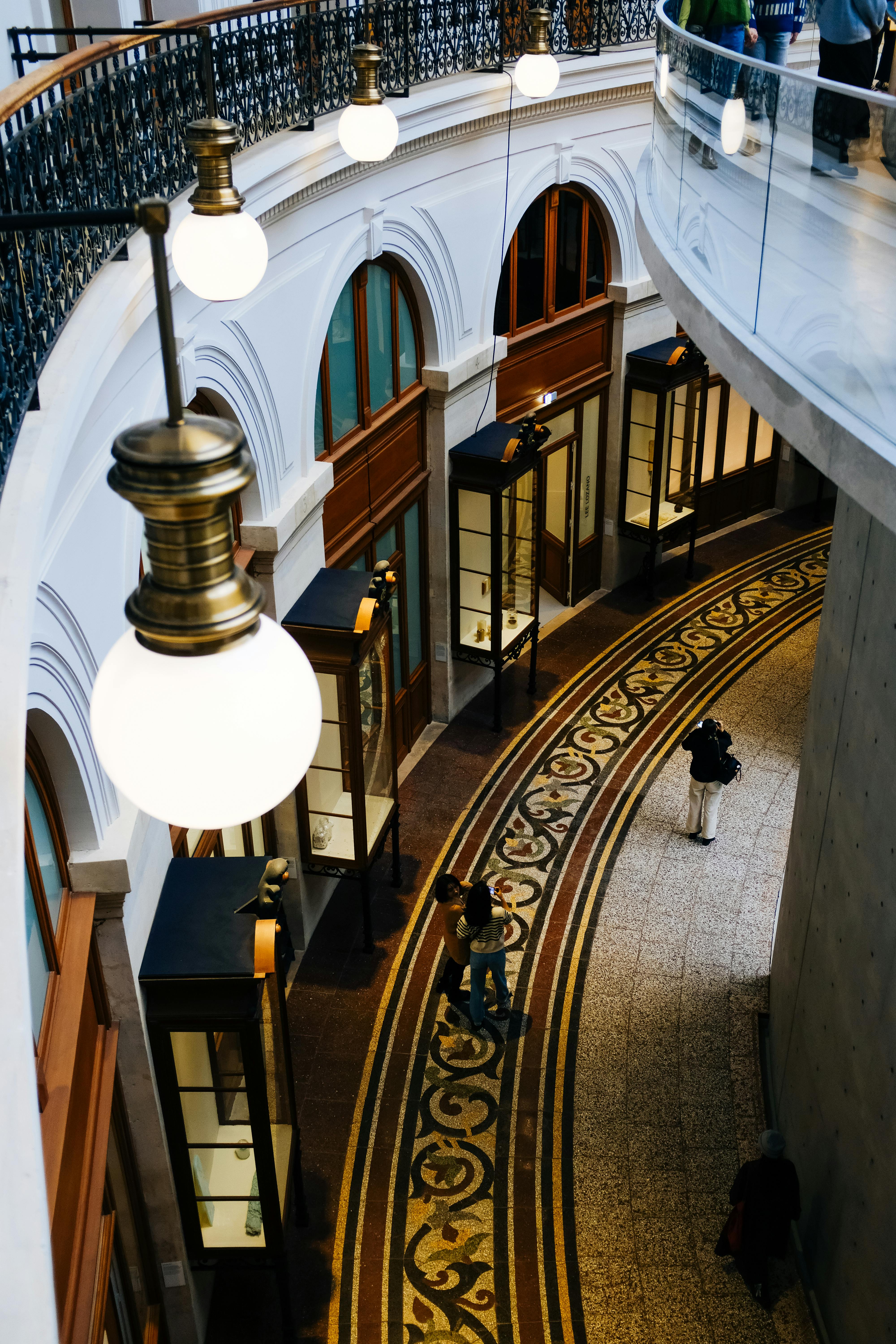 Exterior view of Bourse de Commerce's iconic circular building with iron-glass dome in Paris