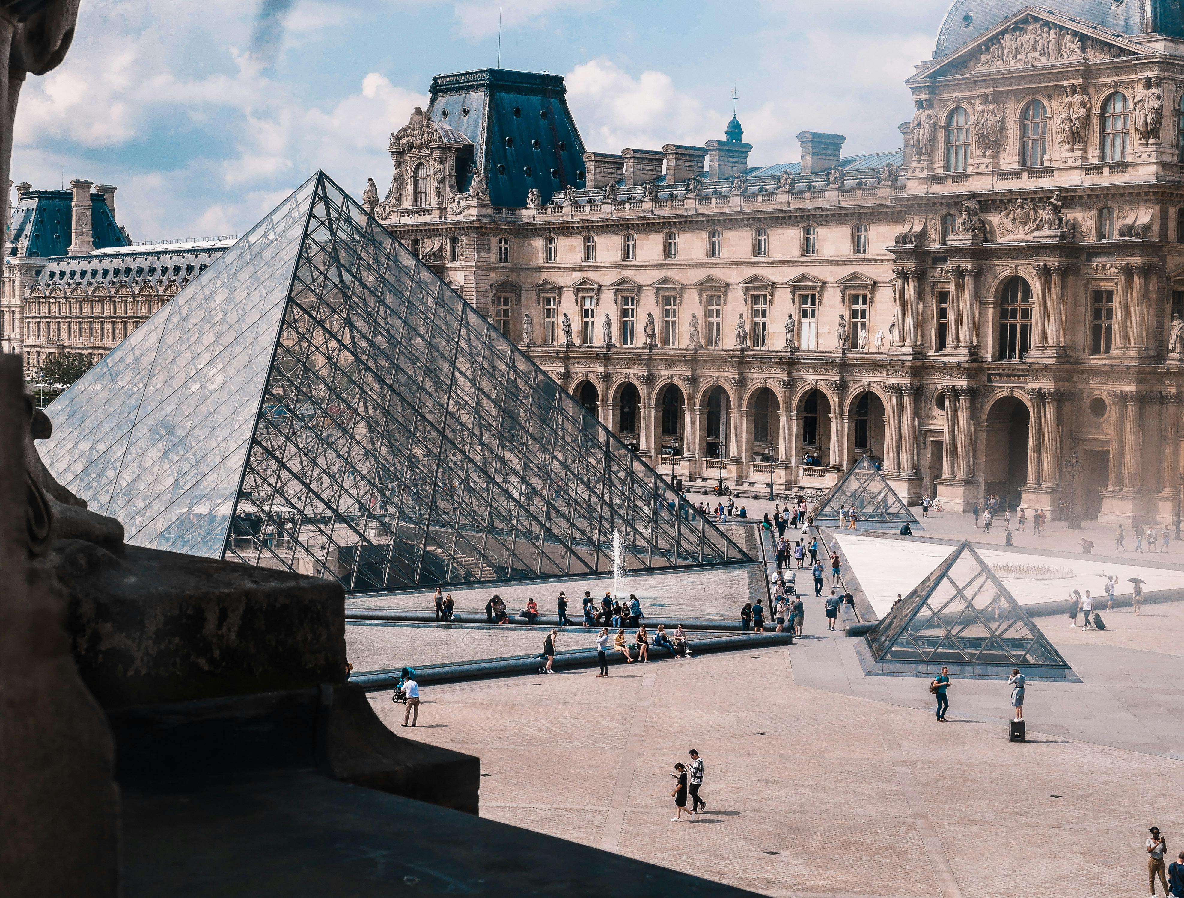 Historic black-and-white photo of the Louvre fortress foundations from 1980s excavations