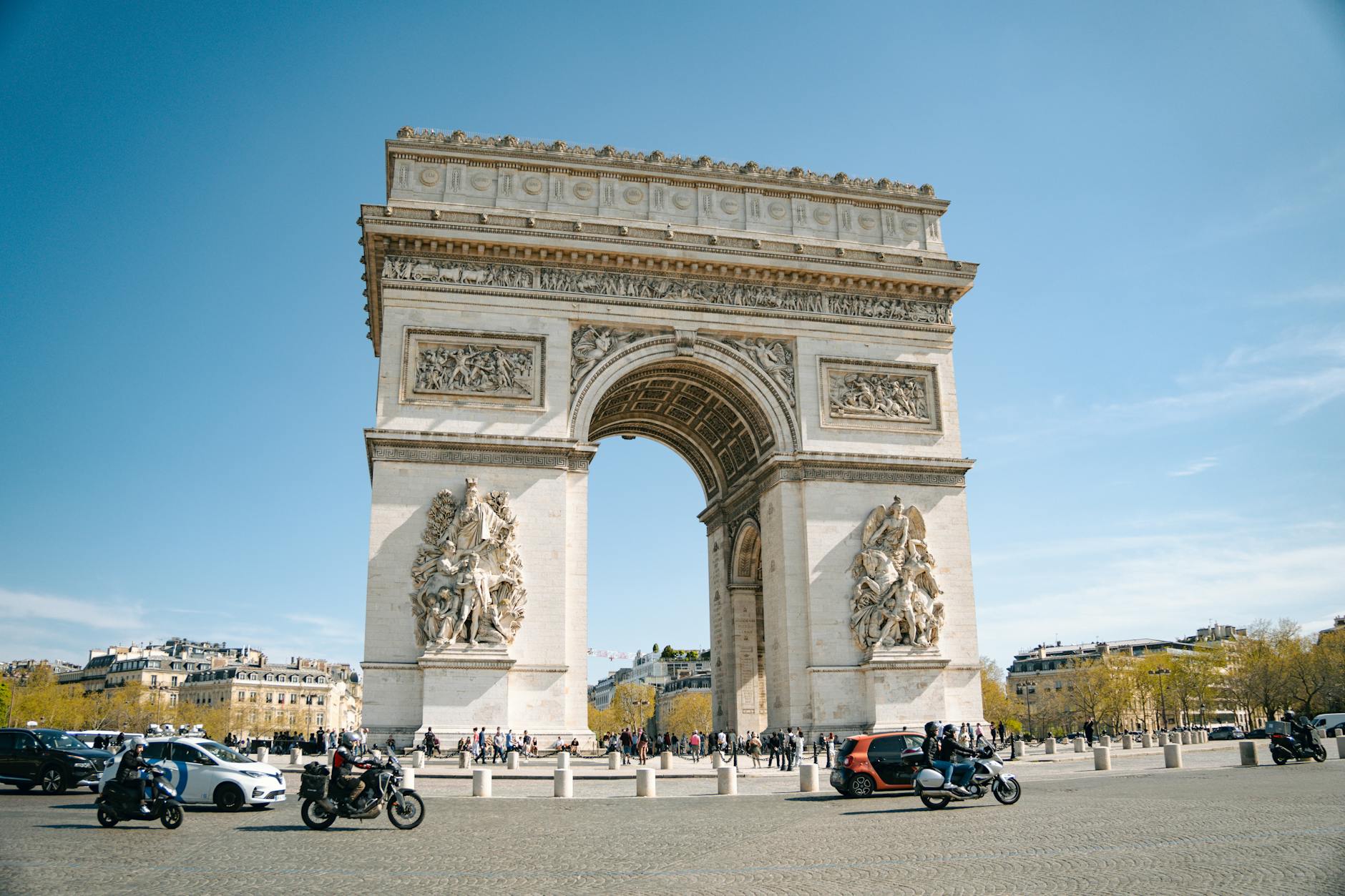 Dramatic cover image of Napoleon's grand monuments and forgotten relics casting shadows over Paris skyline