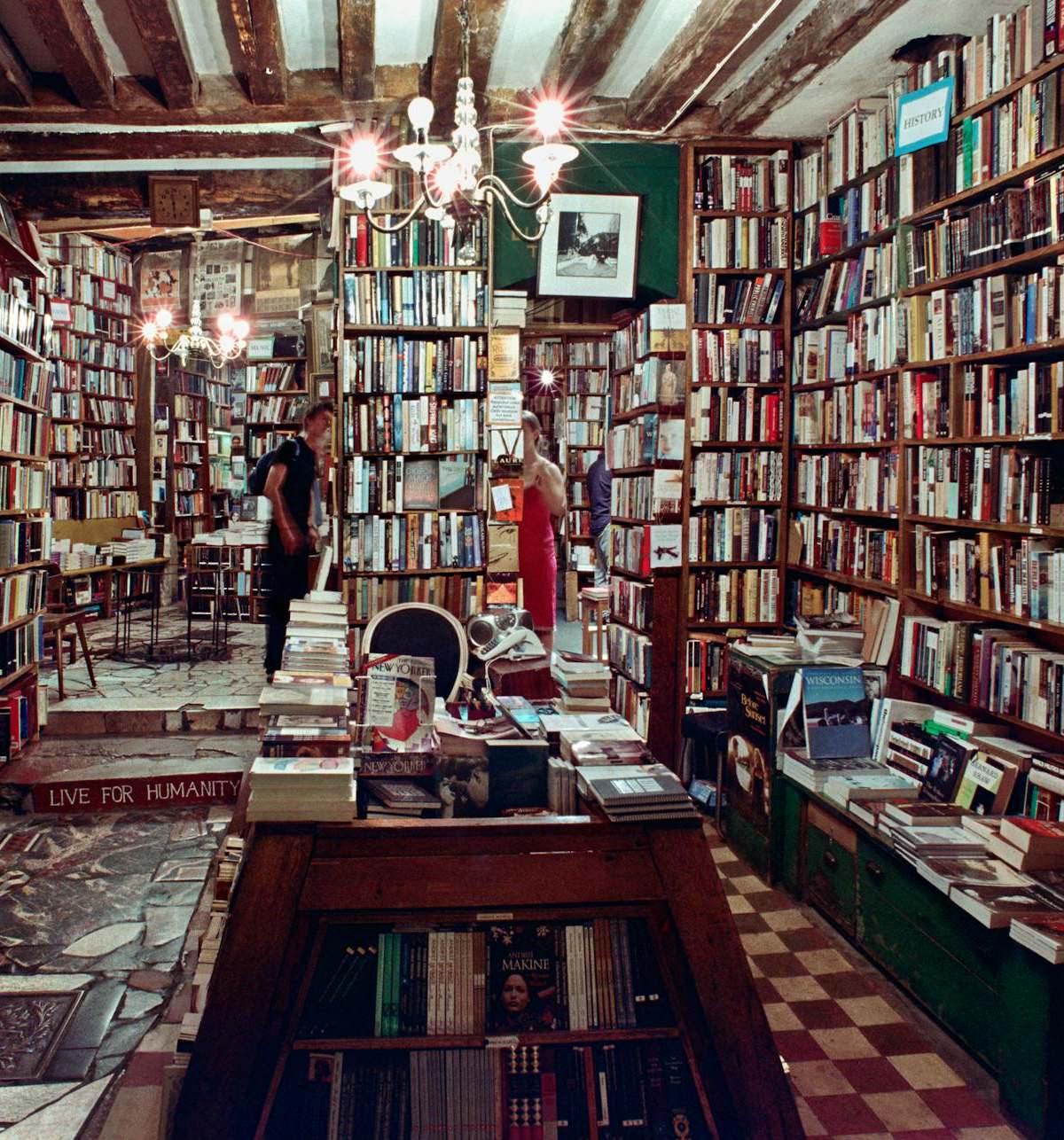 Cover image of The Bookworm's Guide featuring English bookshops in Paris rivaling Shakespeare & Co