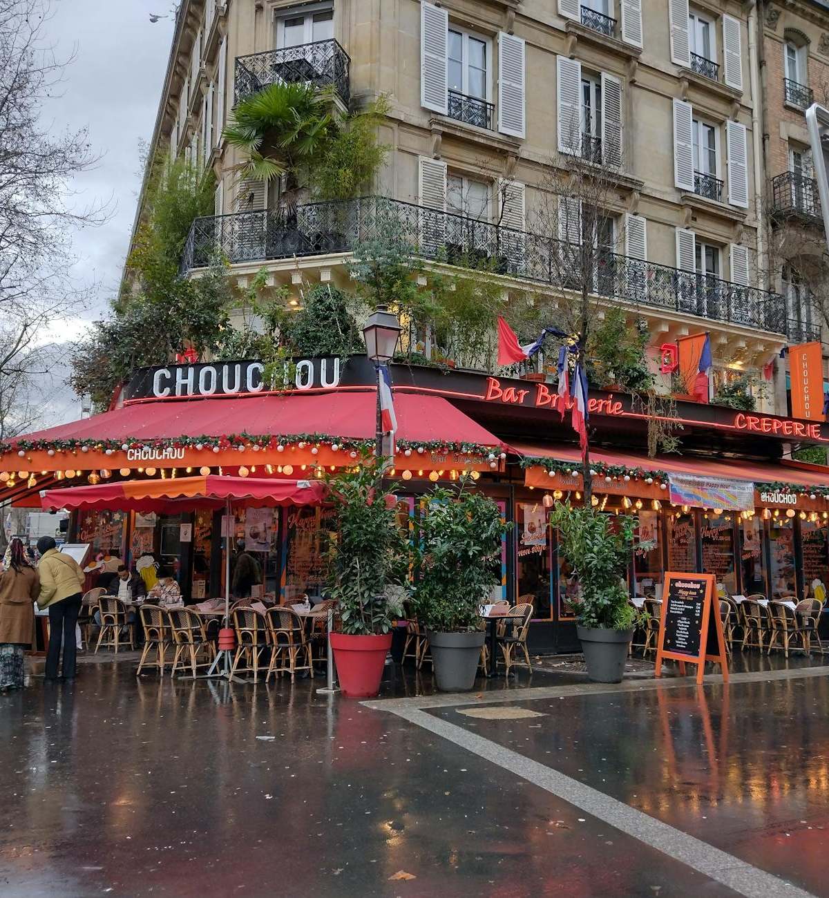Midnight feast at late-night Paris restaurant with gourmet dishes under ambient lighting for insomniac diners