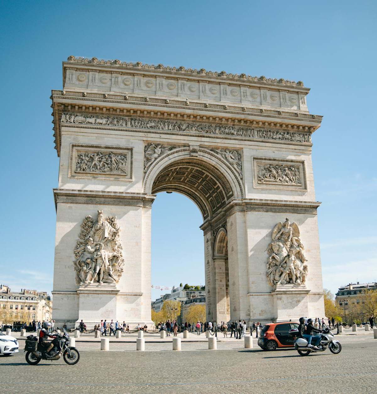 Dramatic cover image of Napoleon's grand monuments and forgotten relics casting shadows over Paris skyline