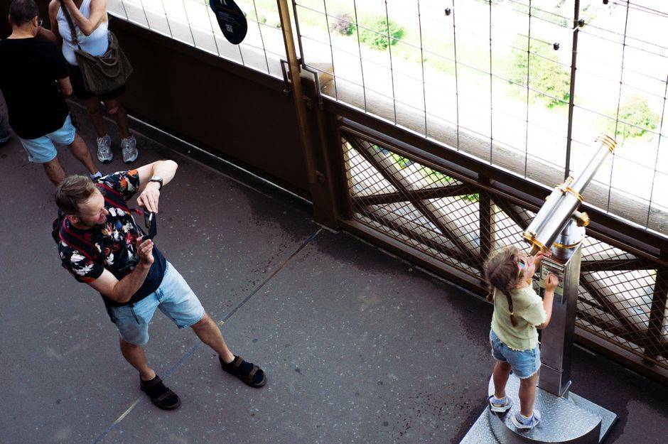 Visitors inside the Eiffel Tower