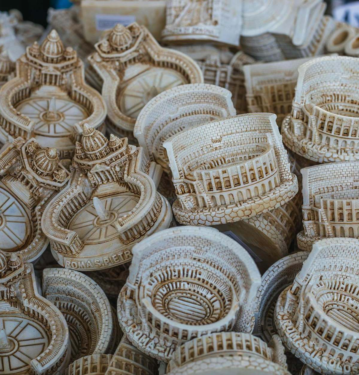 Handcrafted miniatures of Rome landmarks like the Colosseum and St. Peter's Basilica.