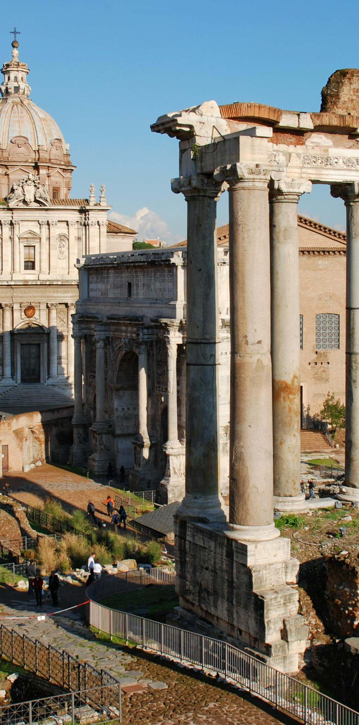 Aerial view of Rome's Colosseum, Roman Forum, and Palatine Hill at sunrise for first-timers itinerary