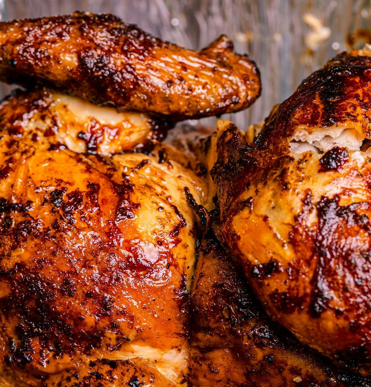 Deliciously roasted rotisserie chicken with crispy skin, perfect for a hearty meal.