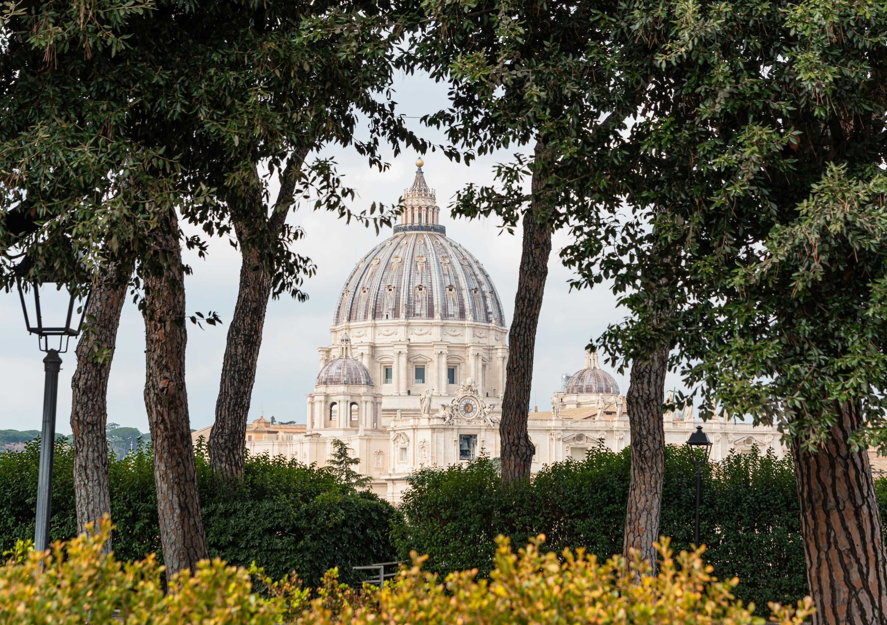 St. Peter's Basilica and Vatican at sunset - Rome, Italy