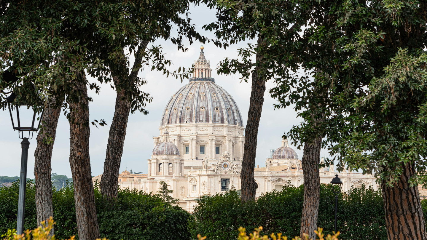 Majestic St. Peter's Basilica in Vatican City at golden sunset, Rome, Italy